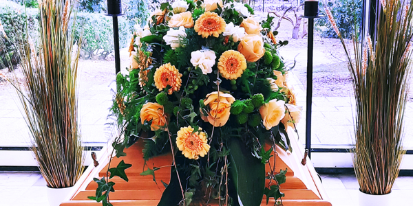 Blumen für den Sarg